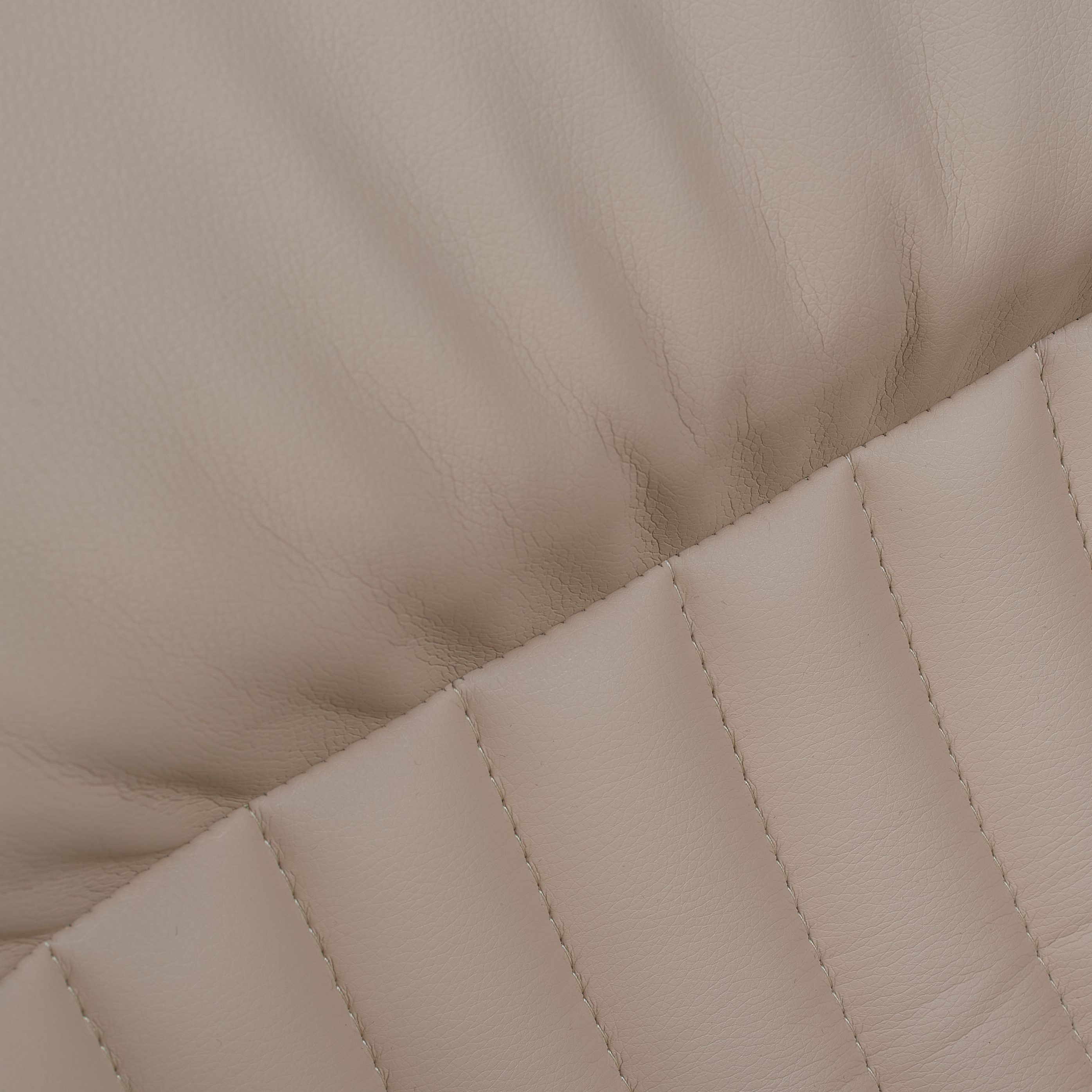 Textură piele ecologică bej și cusături